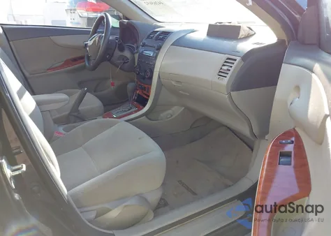 2009 Toyota Corolla Xle z USA, uszkodzony, nr VIN 2T1BU40E99C140230